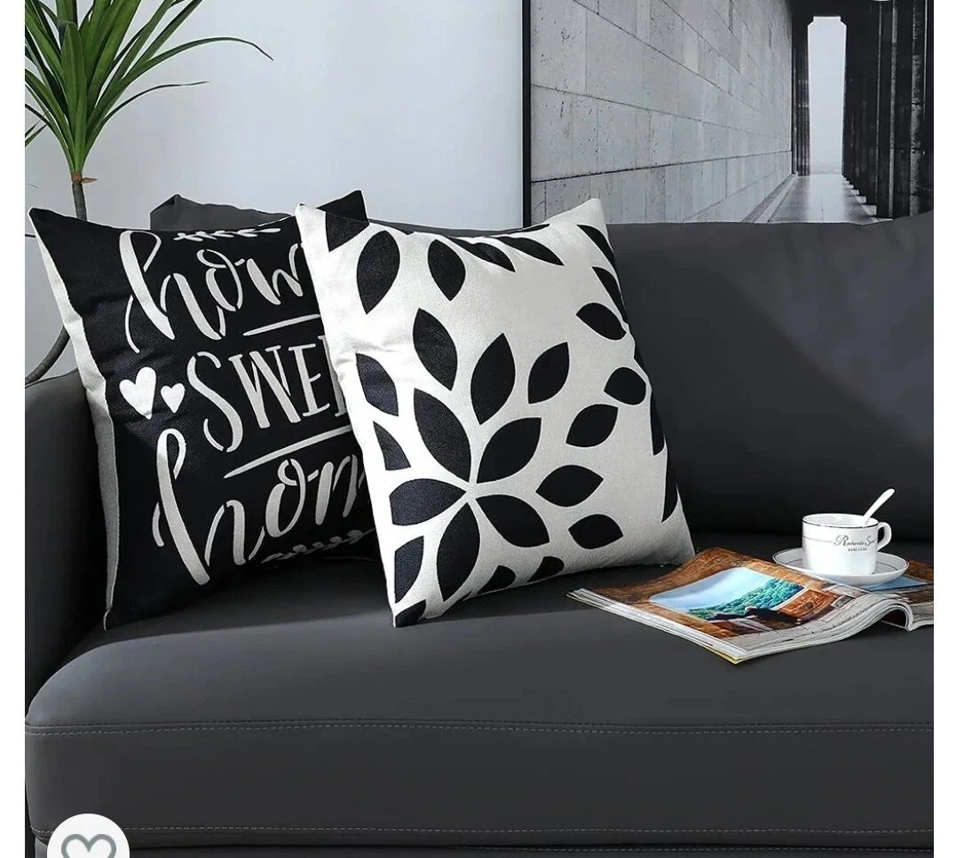 A Set of 2 Black and White Cushions